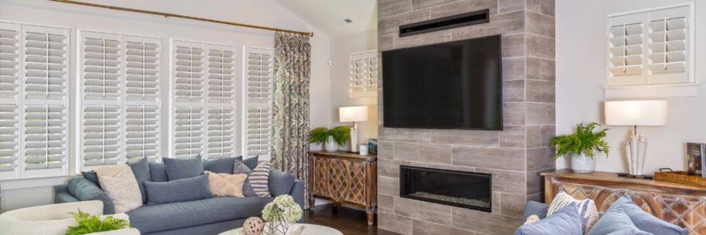 Interior shutters in a El Cajon living room with fireplace